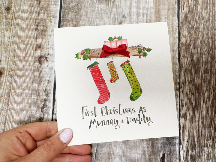 "First Christmas Stockings Mummy and Daddy" Christmas Card - Personalised