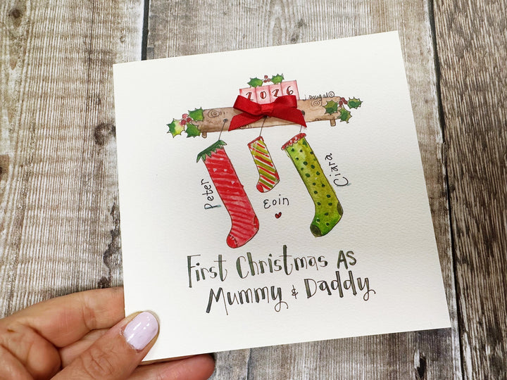 "First Christmas Stockings Mummy and Daddy" Christmas Card - Personalised